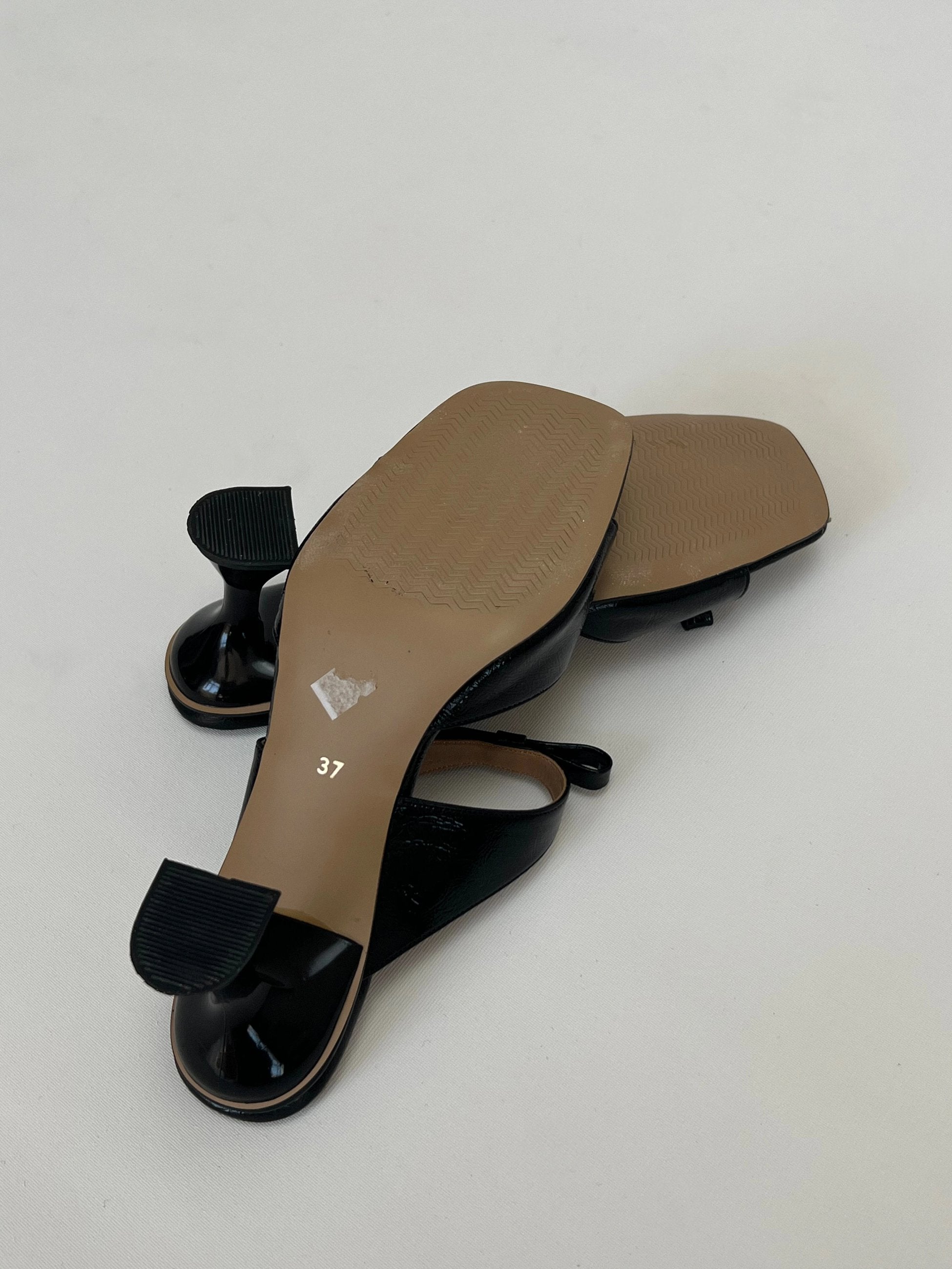 Black High-Heeled Slippers with Bow
